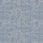 Detail of fabric in a dense herringbone print in dusty blue on a tan field.