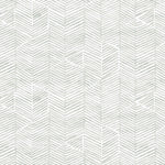 Detail of fabric in a dense herringbone print in light gray on a white field.