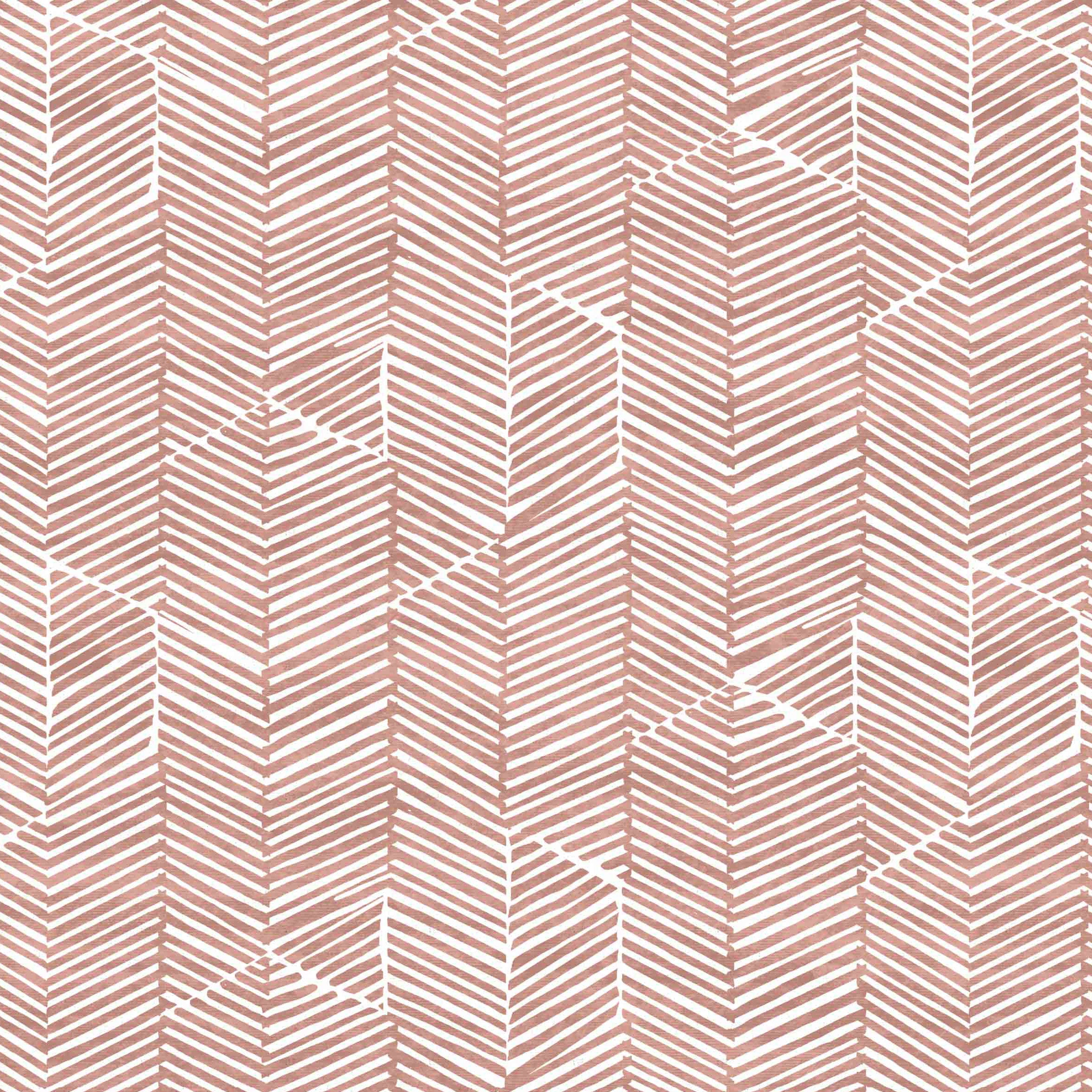 Detail of fabric in a dense herringbone print in brown on a white field.