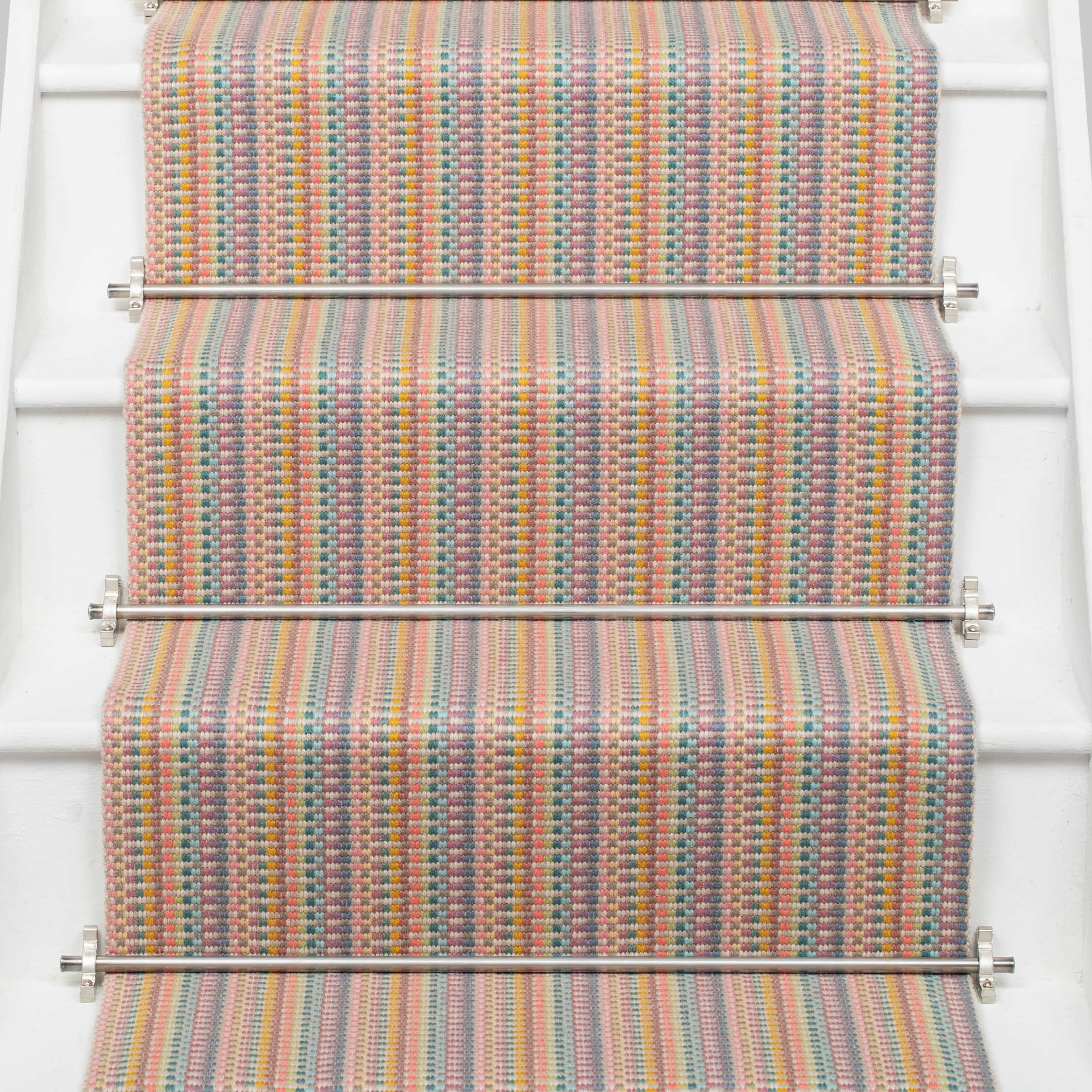 Striped flatweave runner in tan blue green on white staircase