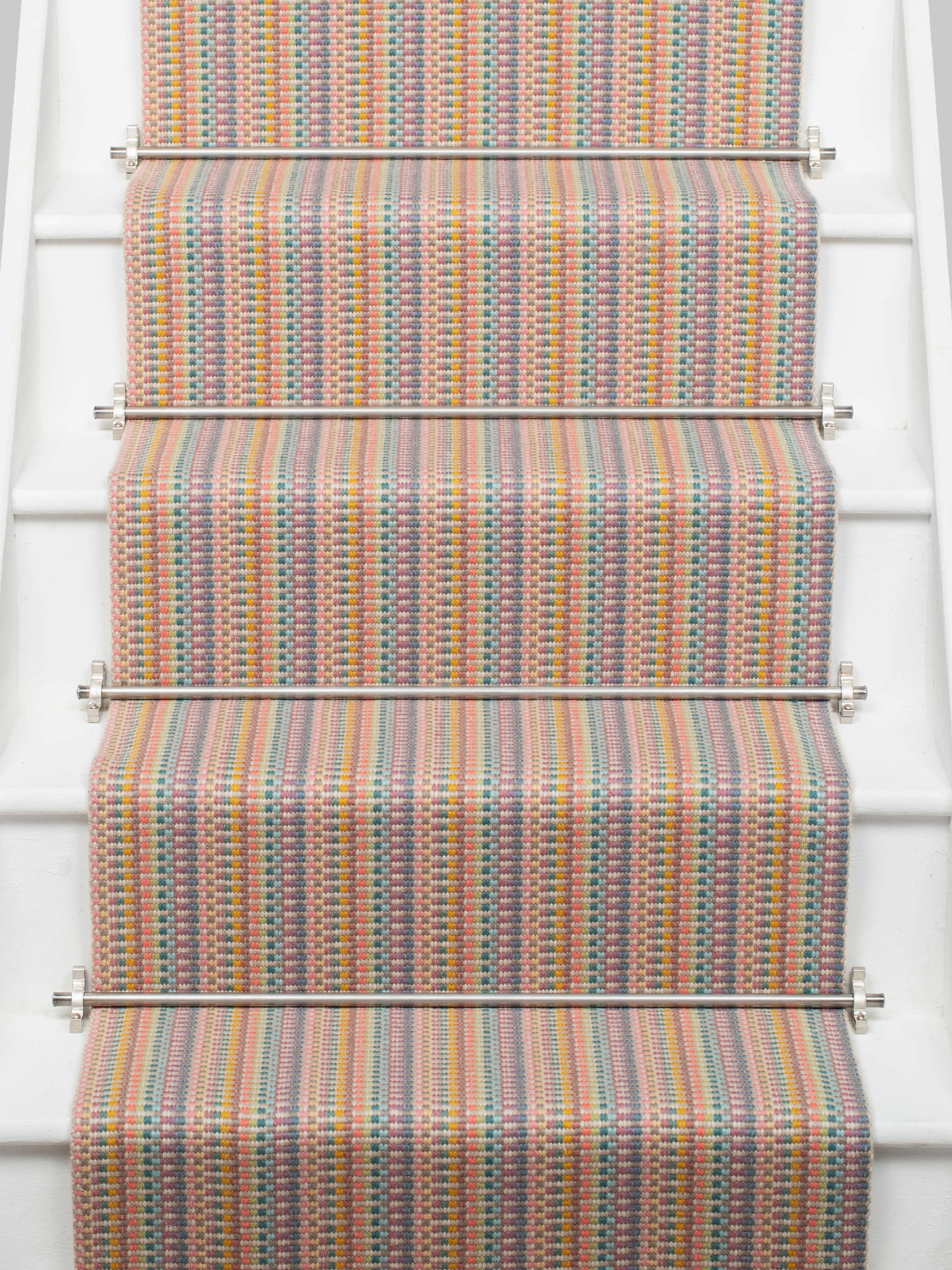 Striped flatweave runner in tan blue green on white staircase