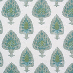 Detail of fabric in a botanical damask print in shades of green and blue on a cream field.