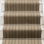 Striped flatweave runner in tan and brown on white staircase