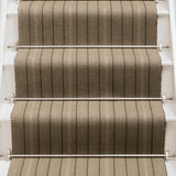 Striped flatweave runner in tan and brown on white staircase