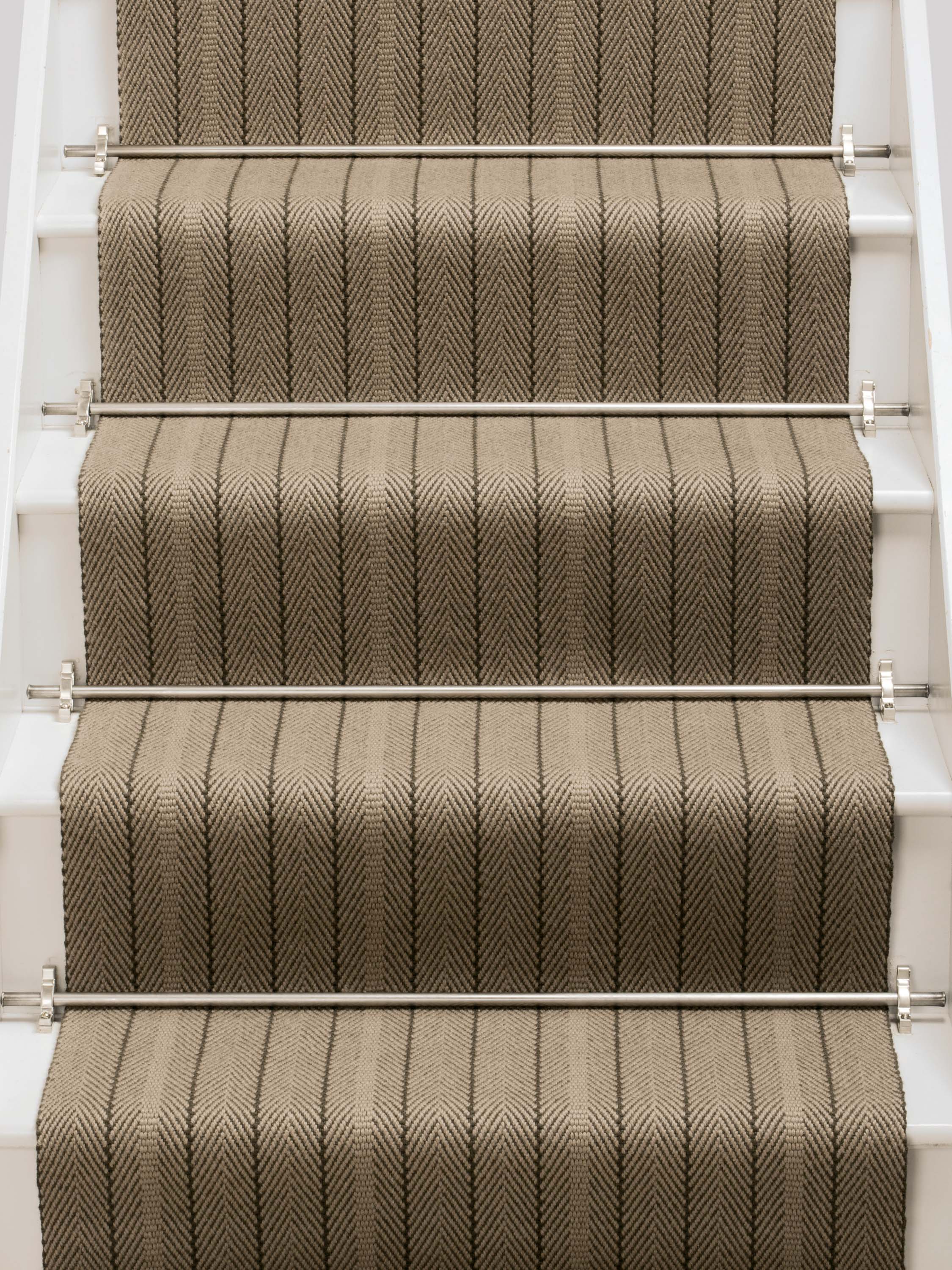 Striped flatweave runner in tan and brown on white staircase