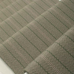 Striped flatweave runner in sage on white staircase