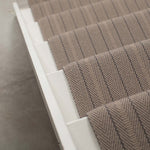 Striped flatweave runner in grey on white staircase