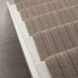 Striped flatweave runner in grey on white staircase