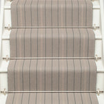 Striped flatweave runner in light grey on white staircase