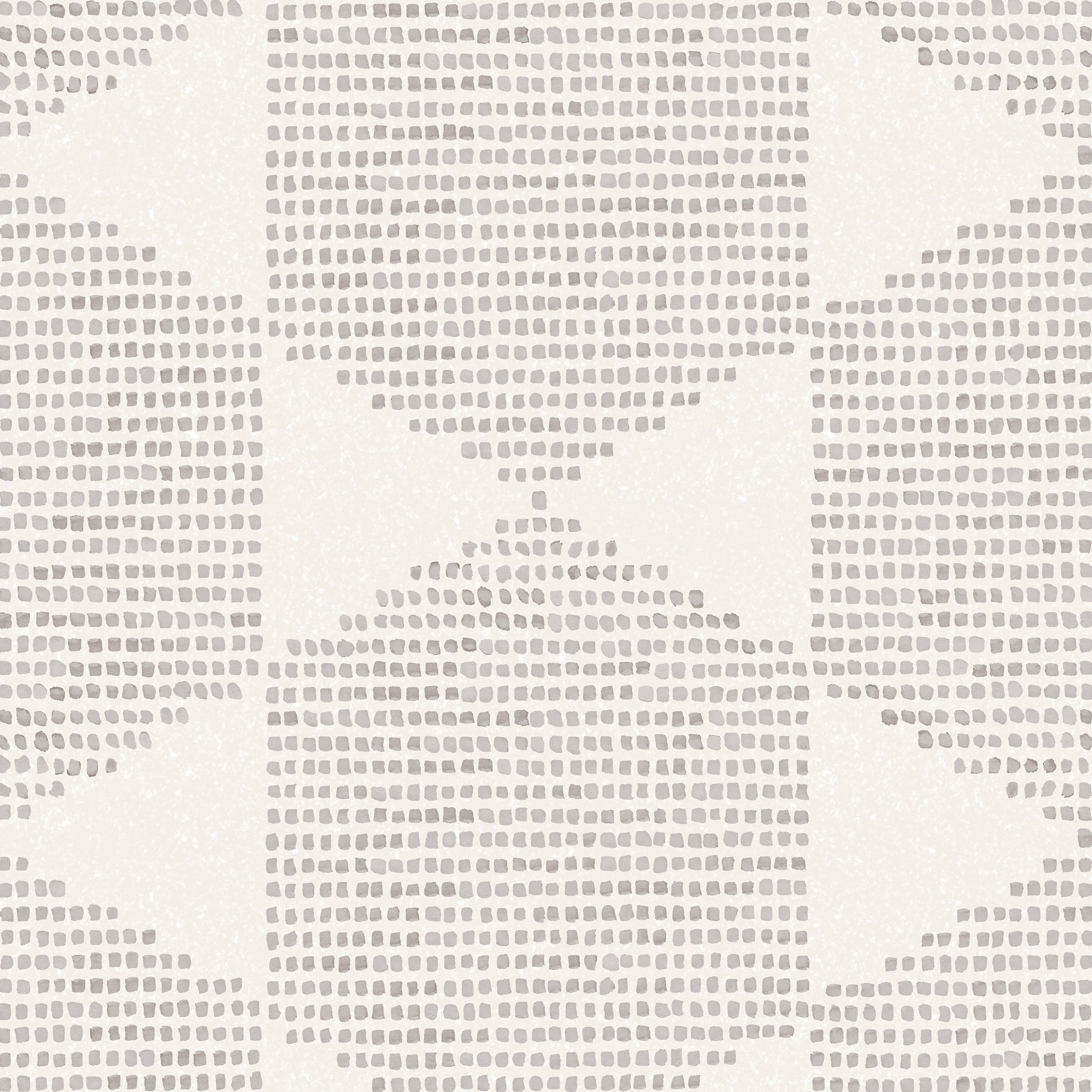 Detail of wallpaper in a geometric star print in light gray on a cream field.