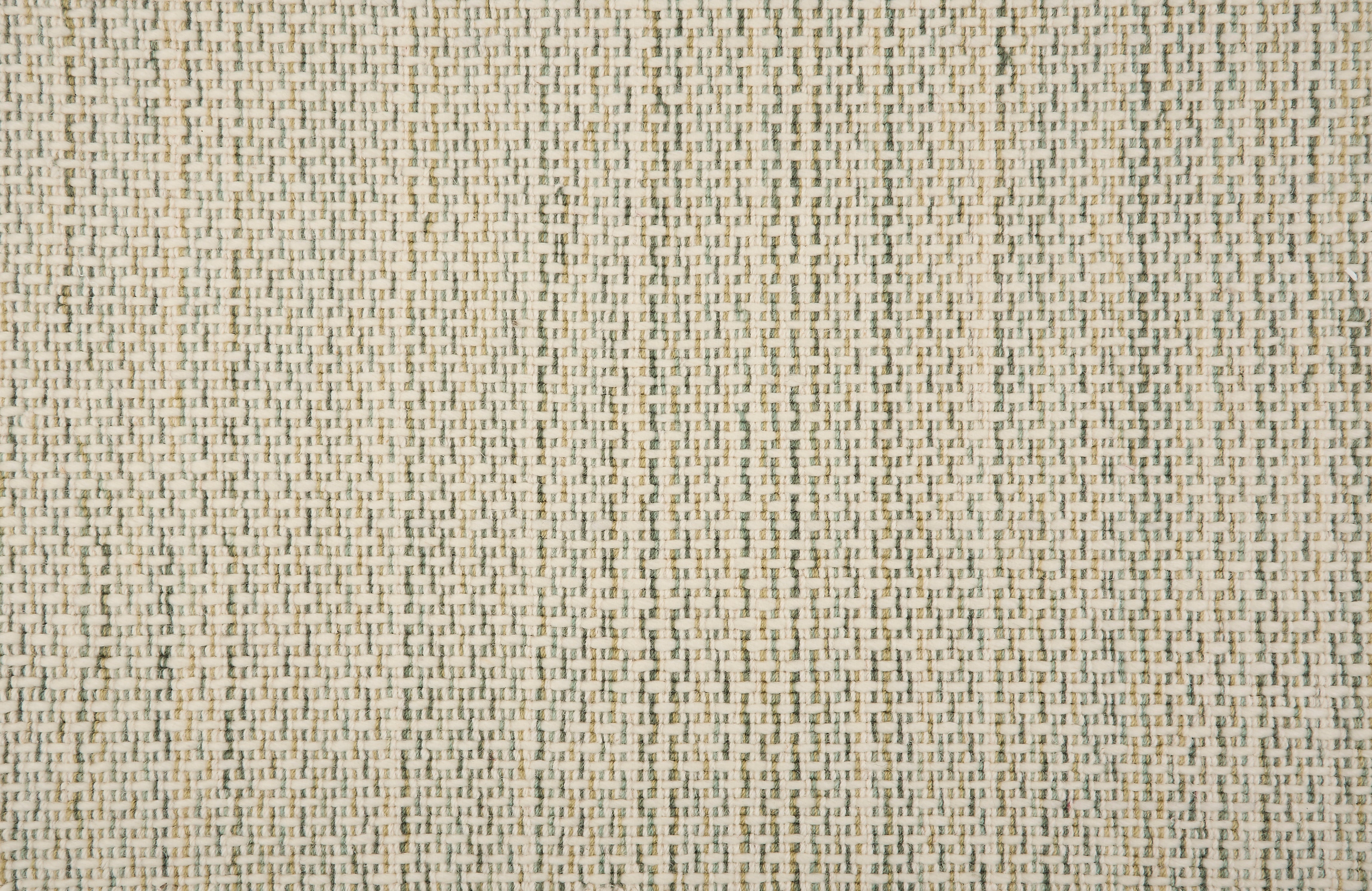 Broadloom carpet with a textural stripe in shades of cream and green. 