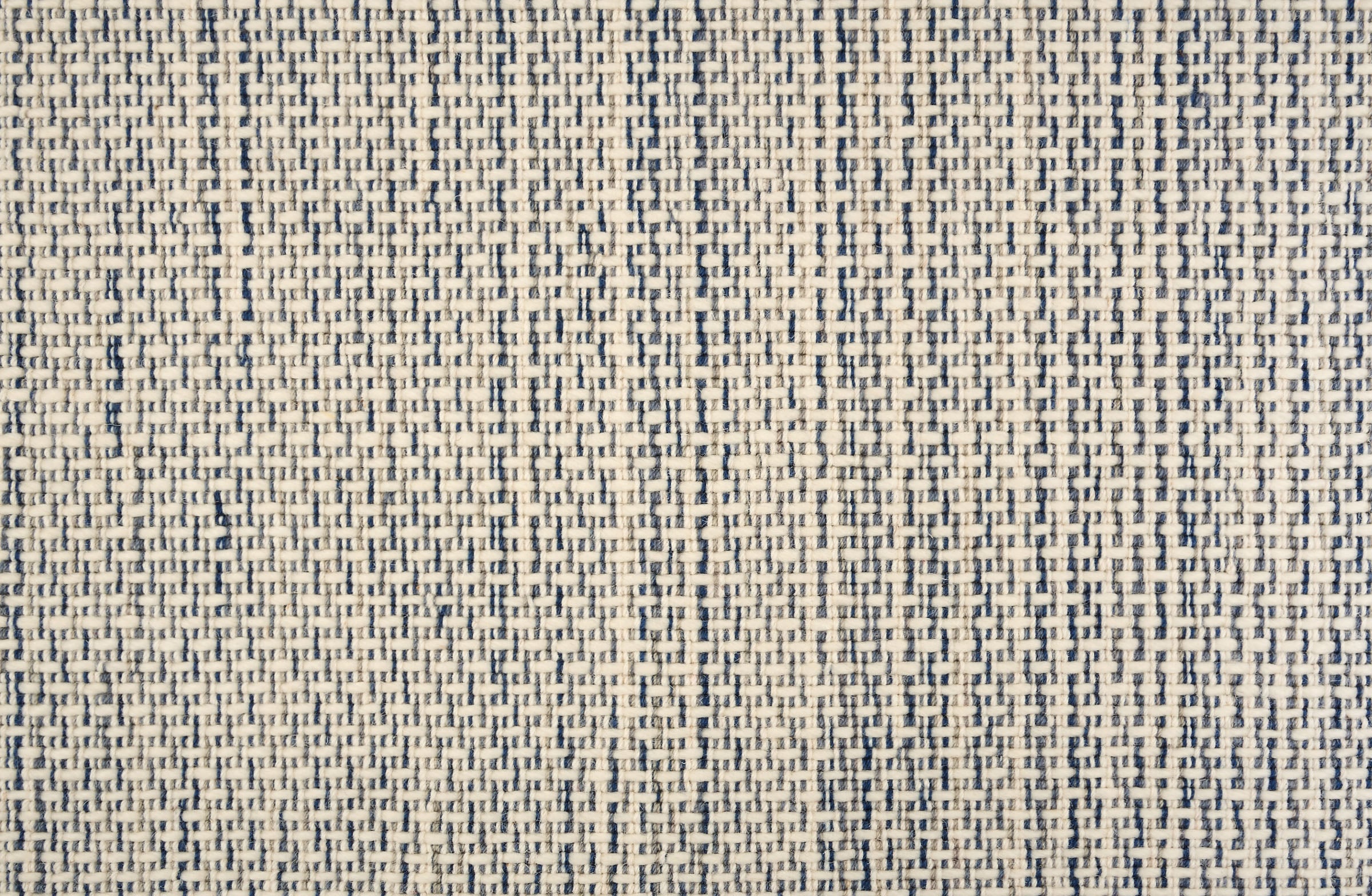 Broadloom carpet with a textural stripe in shades of cream and blue. 
