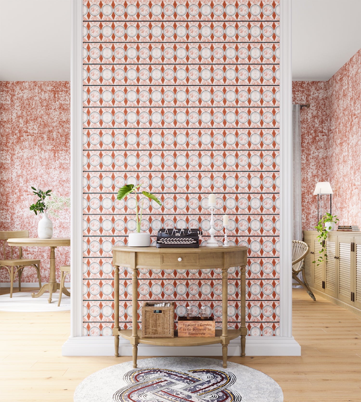 A maximalist living space with an accent wall papered in an intricate geometric stripe in shades of rust, gray and cream.