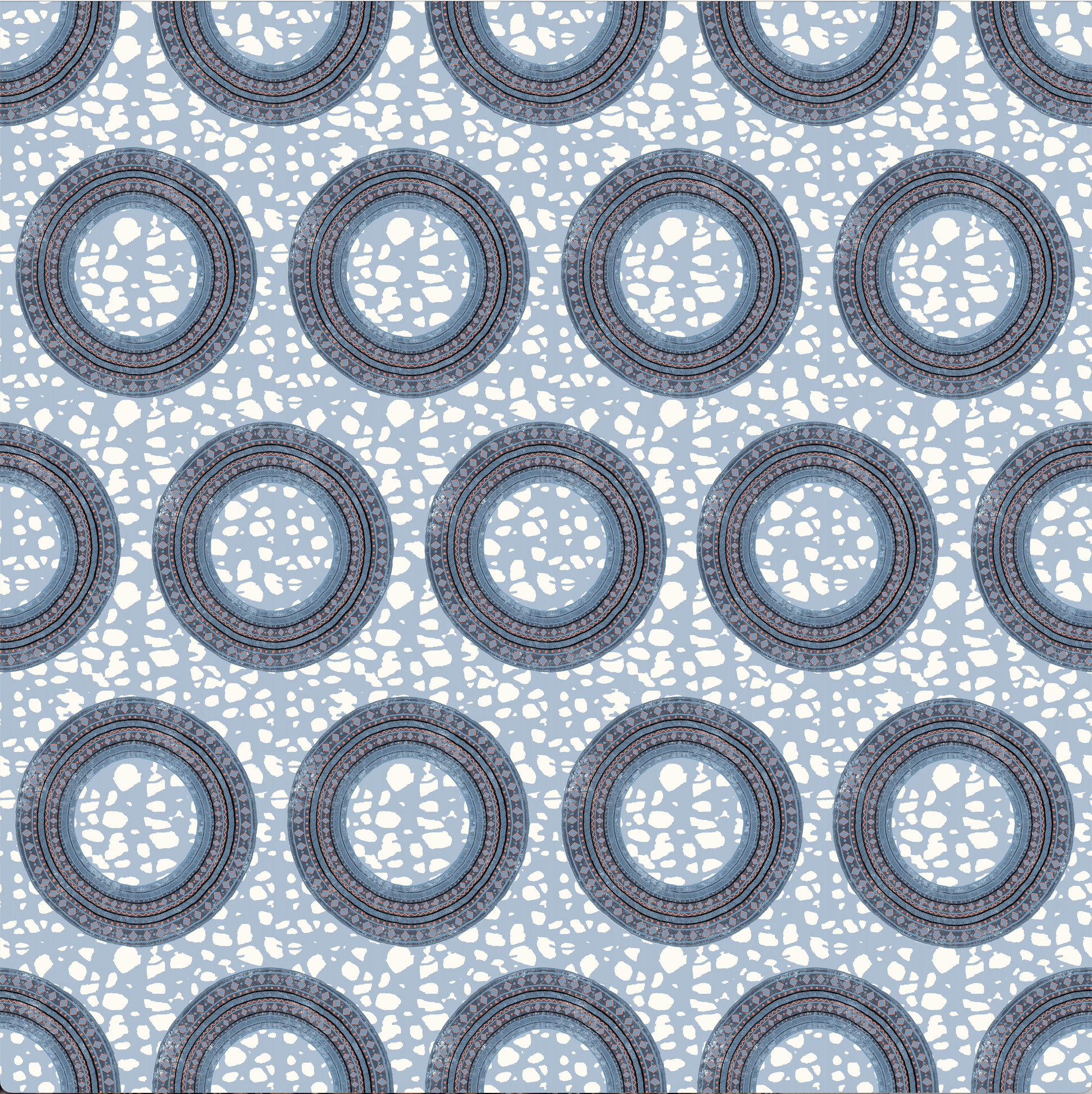 Pattern of circular shapes on a light blue background