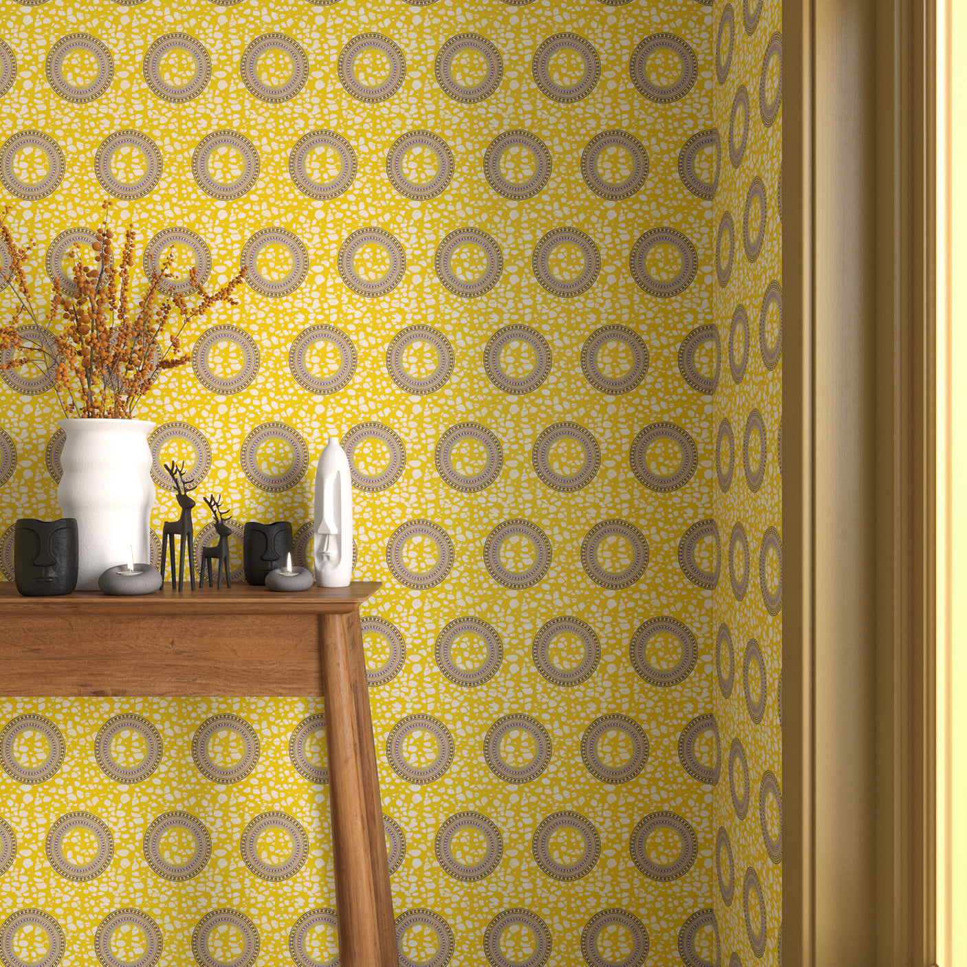 Interior with bright yellow circle printed wallpaper and matching trim with a wooden console table with white ceramic vases and mini ceramic sculptures. 