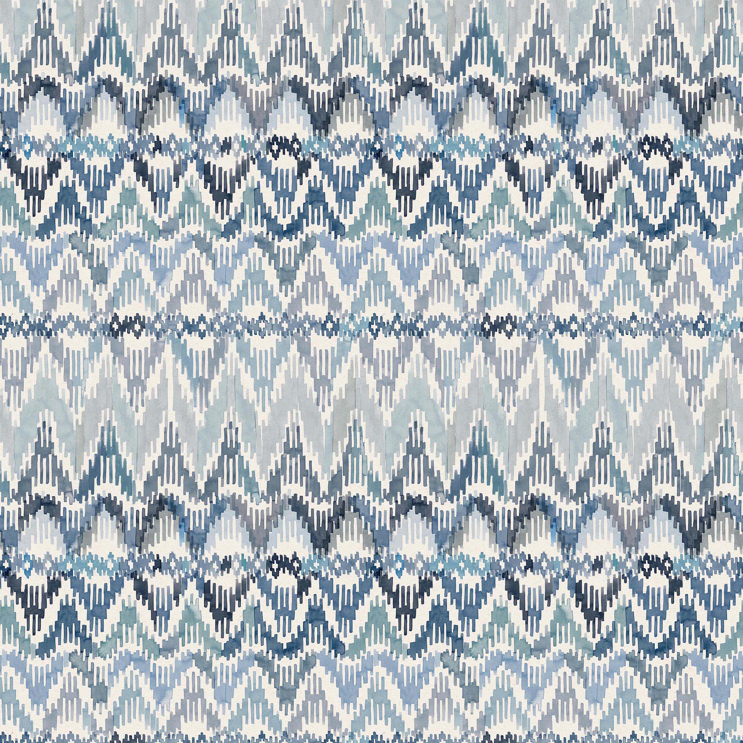 Detail of fabric in a painterly ikat print in shades of blue and navy on a white field.