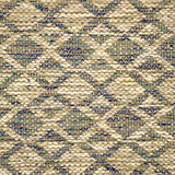 Handwoven rug detail in a lattice stripe design in blue, green, beige