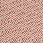 Detail of woven fabric in a geometric grid print in red and navy on a cream field.