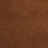 Detail of velvet fabric yardage in rust.