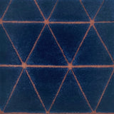 Handknotted rug with  blue and orange geometric pattern 