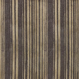 Detail of wallpaper in an irregular stripe print in shades of gold and brown.