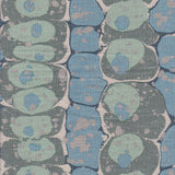 Detail of fabric in a marbled paint print in shades of blue, sage and gray.