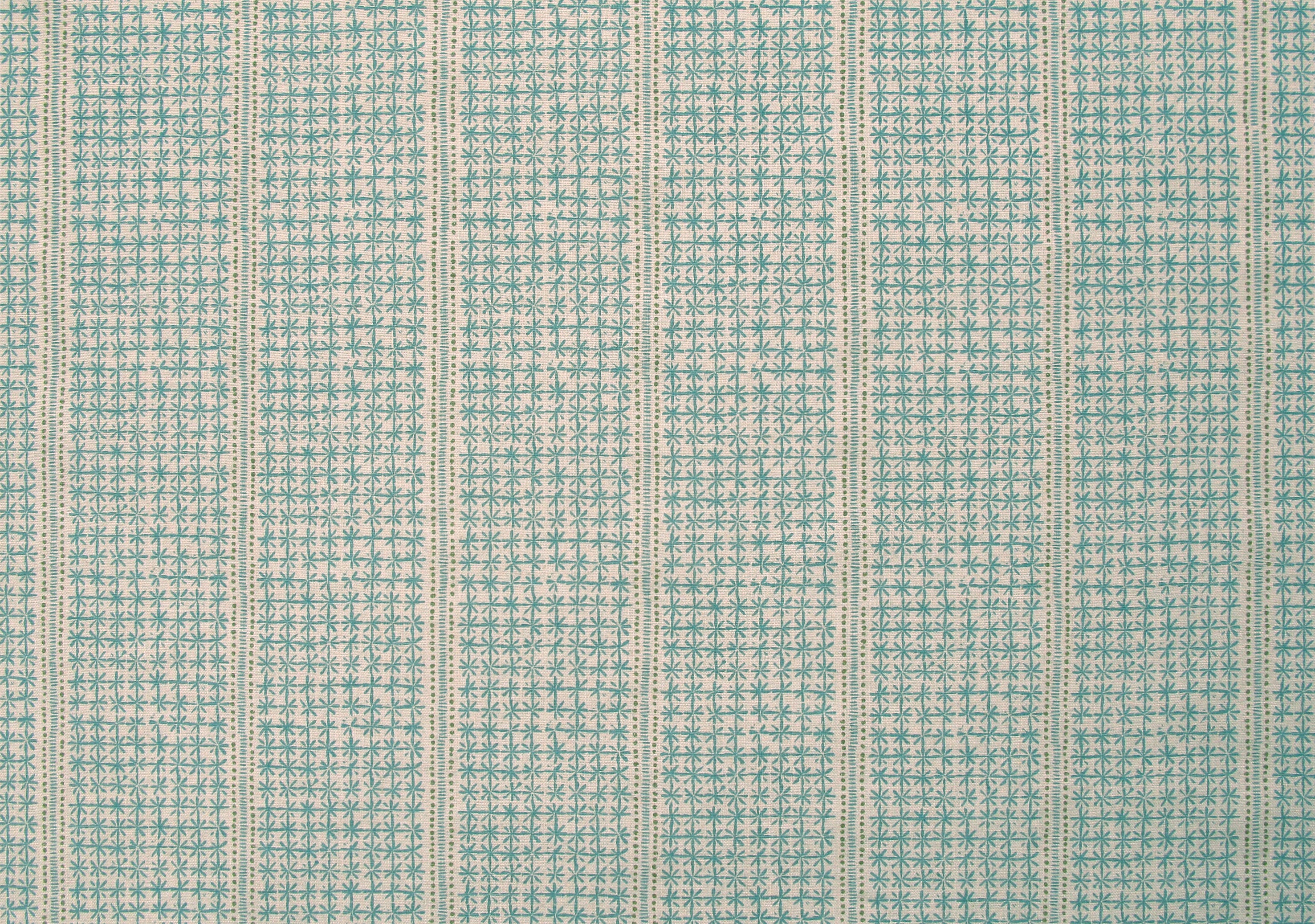 Detail of fabric in a dense repeating stripe and star print in turquoise on a tan field.