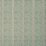 Detail of fabric in a dense repeating stripe and star print in green on a tan field.