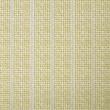 Detail of fabric in a dense repeating stripe and star print in mustard on a cream field.