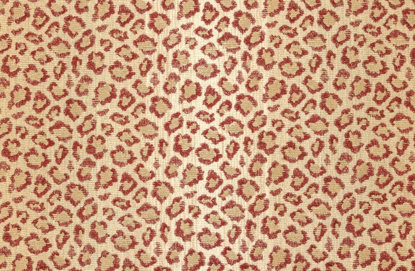 Broadloom carpet swatch in a leopard skin pattern, in red and tan