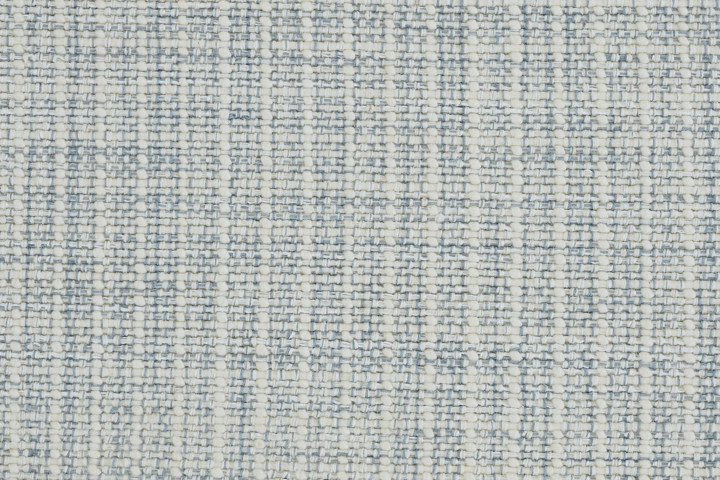 Textural basketweave broadloom in light blue.