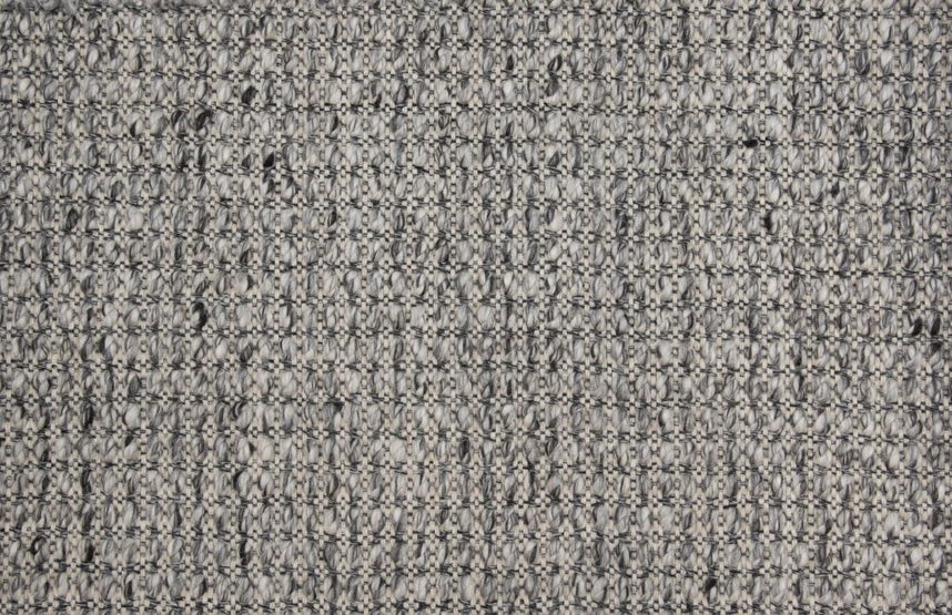 Broadloom carpet swatch in a textured pattern in a dark grey design