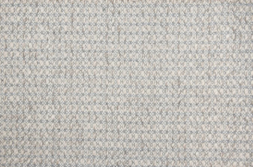 Broadloom carpet swatch in a textured pattern in a grey cream design