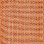 Textured woven outdoor carpe in orange.