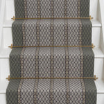 Diamond flatweave runner design in grey on white stairs