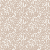 Patterned fabric with textural white dots on a beige background