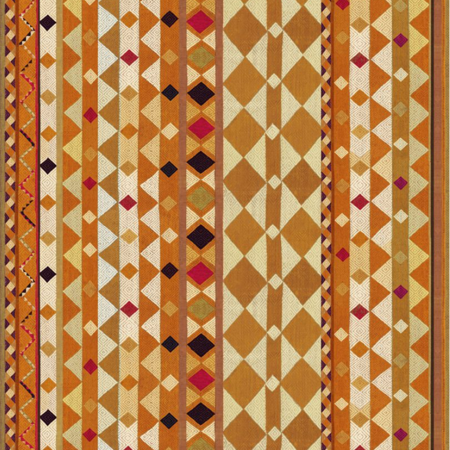 Detail of fabric in a global geometric print in shades of orange, yellow, brown and red.