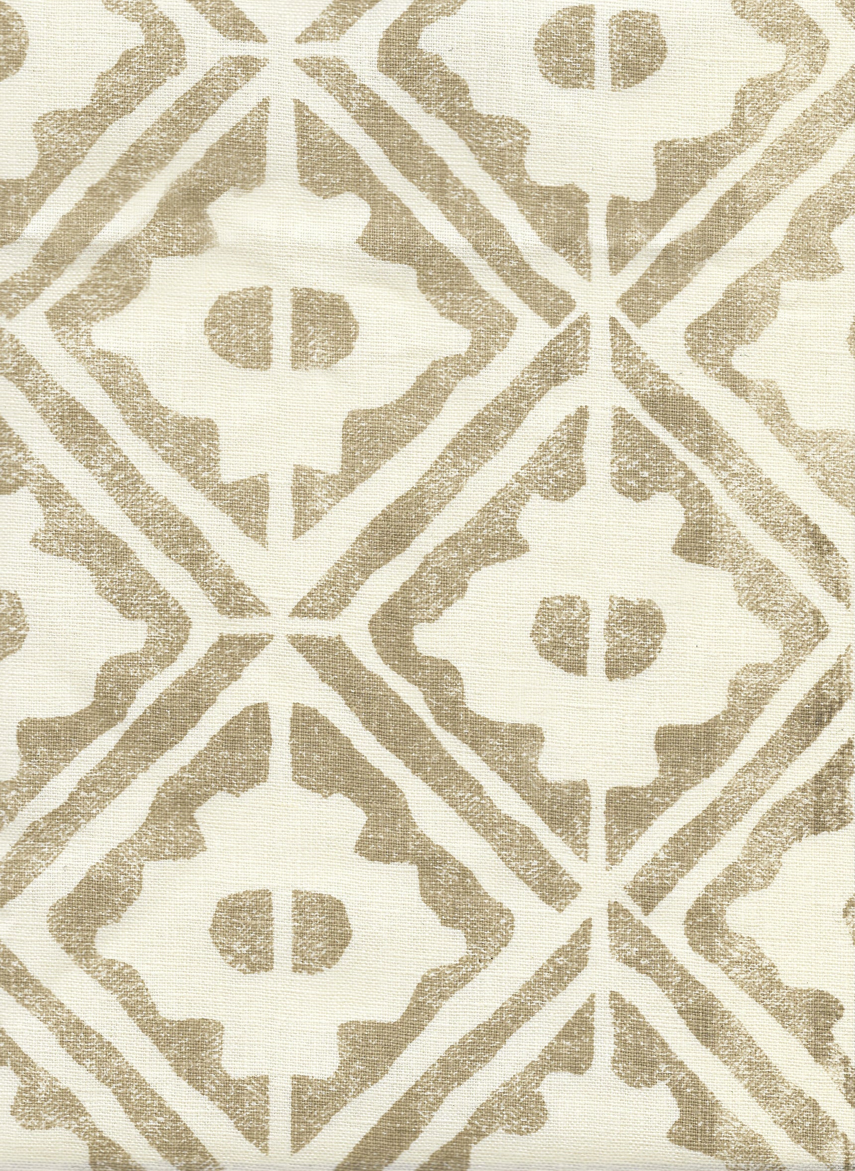 Detail of fabric in a geometric lattice grid in tan on a cream field.