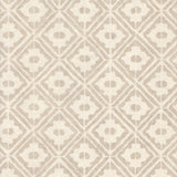 Detail of wallpaper in a geometric lattice print in tan on a cream field.