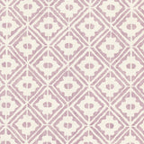 Detail of wallpaper in a geometric lattice print in purple on a cream field.