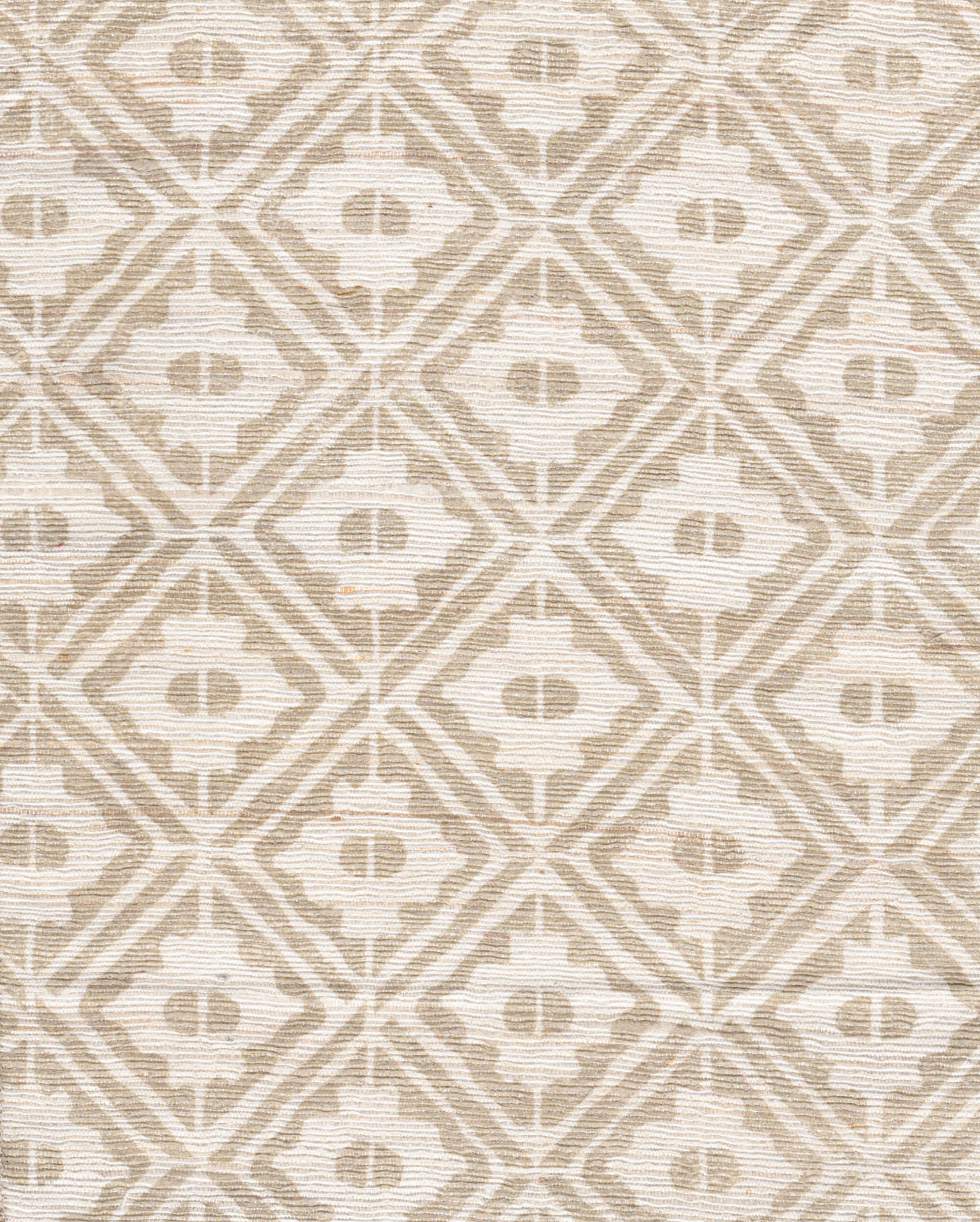 Detail of fabric in a geometric lattice grid in tan on a cream field.