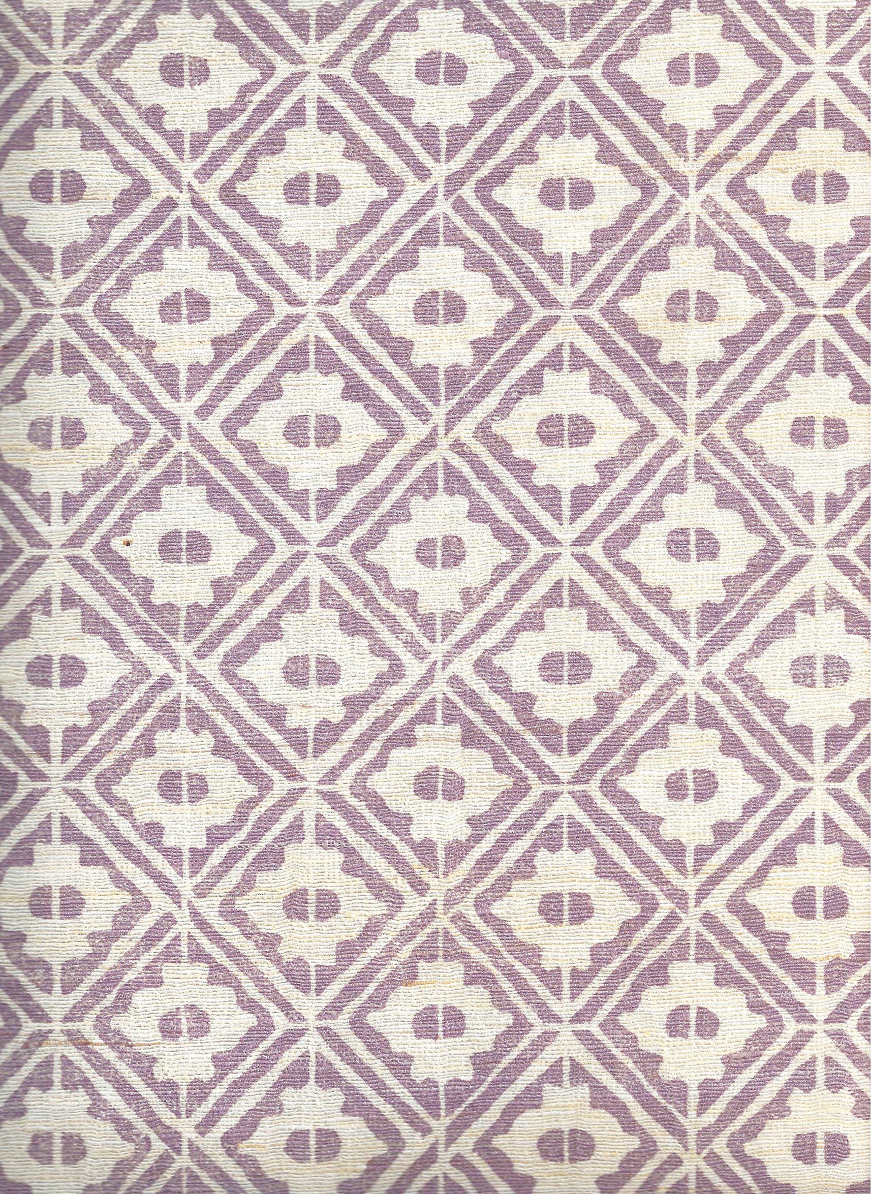 Detail of fabric in a geometric lattice grid in purple on a cream field.