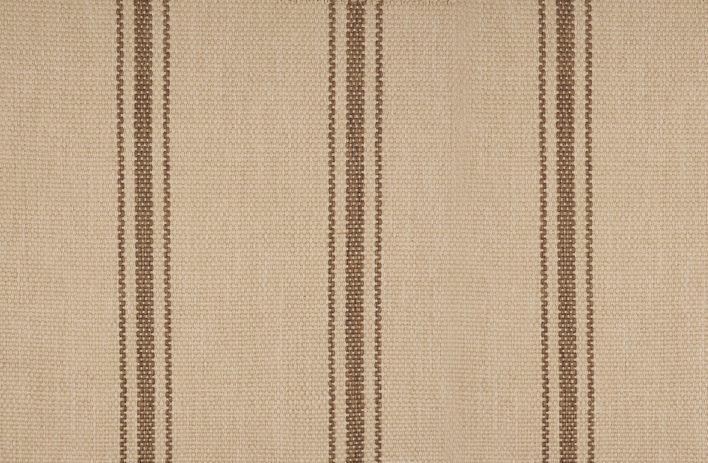 Outdoor broadloom carpet in a wide stripe in brown and creme. 