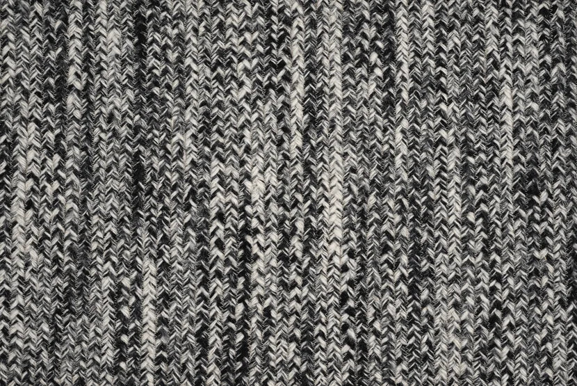 Broadloom carpet swatch in a textured pattern in a black white design