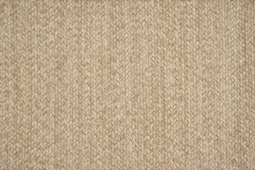 Broadloom carpet swatch in a textured pattern in a tan design