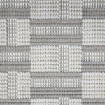 Broadloom carpet in a complex checkerboard pattern in ivory and cool grey.