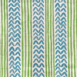 Detail of fabric in a painterly stripe and chevron print in blue and green on a white field.