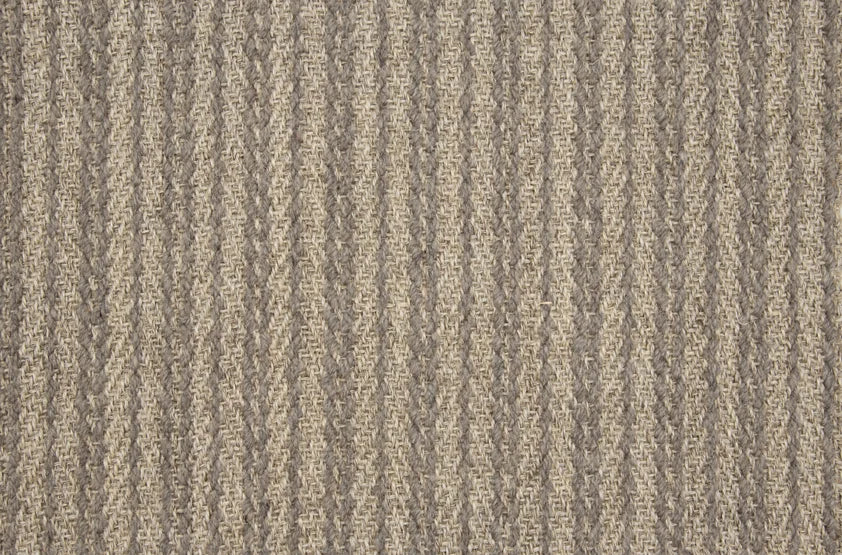 Broadloom carpet swatch in striped woven pattern dark grey color