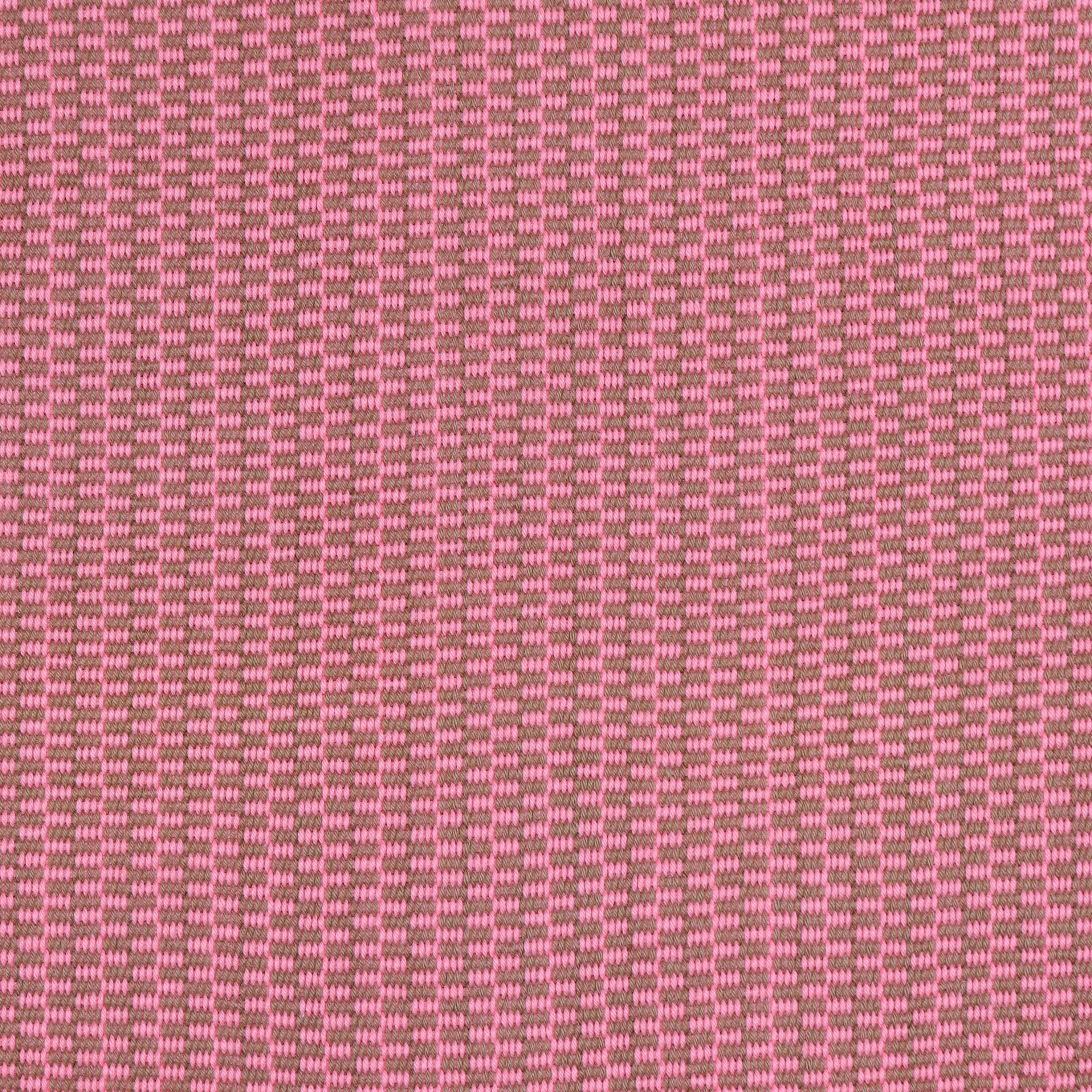 Detail of a hand-woven cotton fabric in a grid pattern in pink and brown.