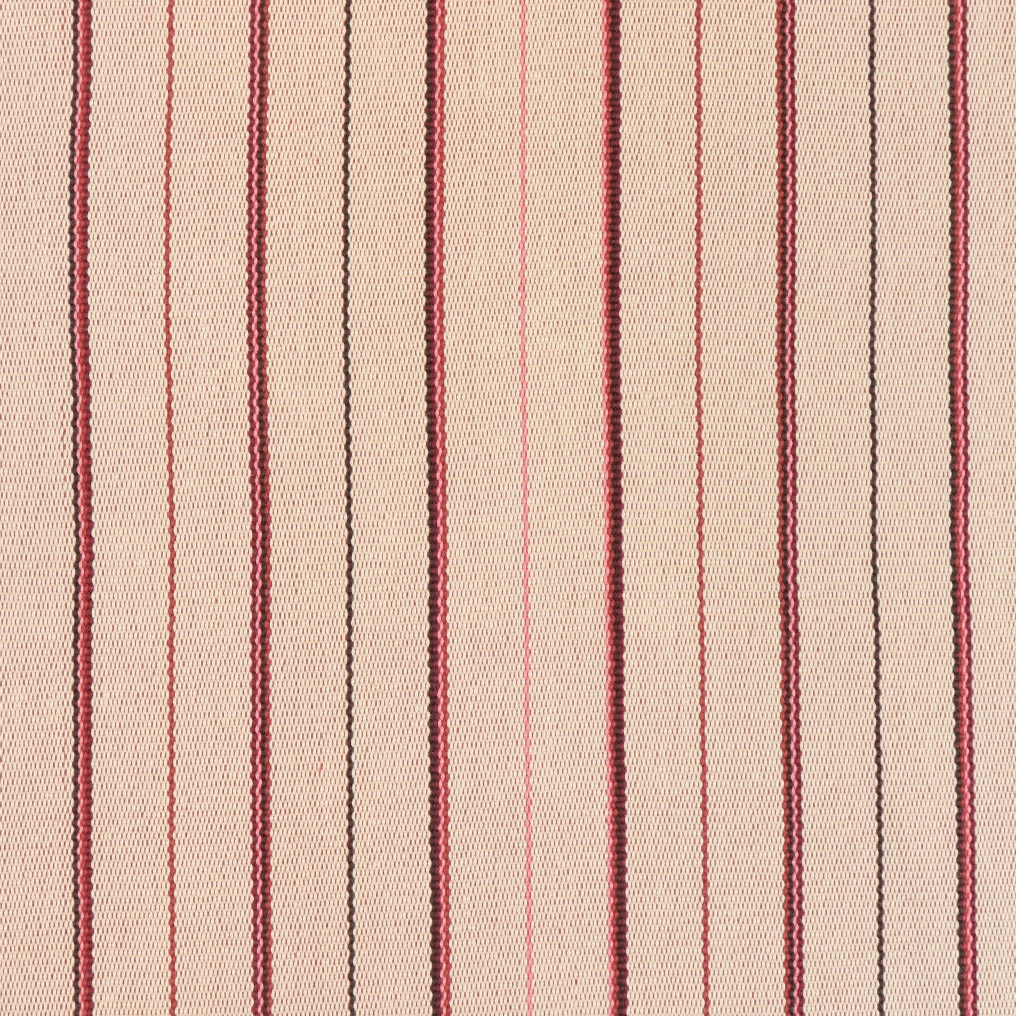 Detail of a hand-woven cotton striped fabric in cream brown, red and pink.